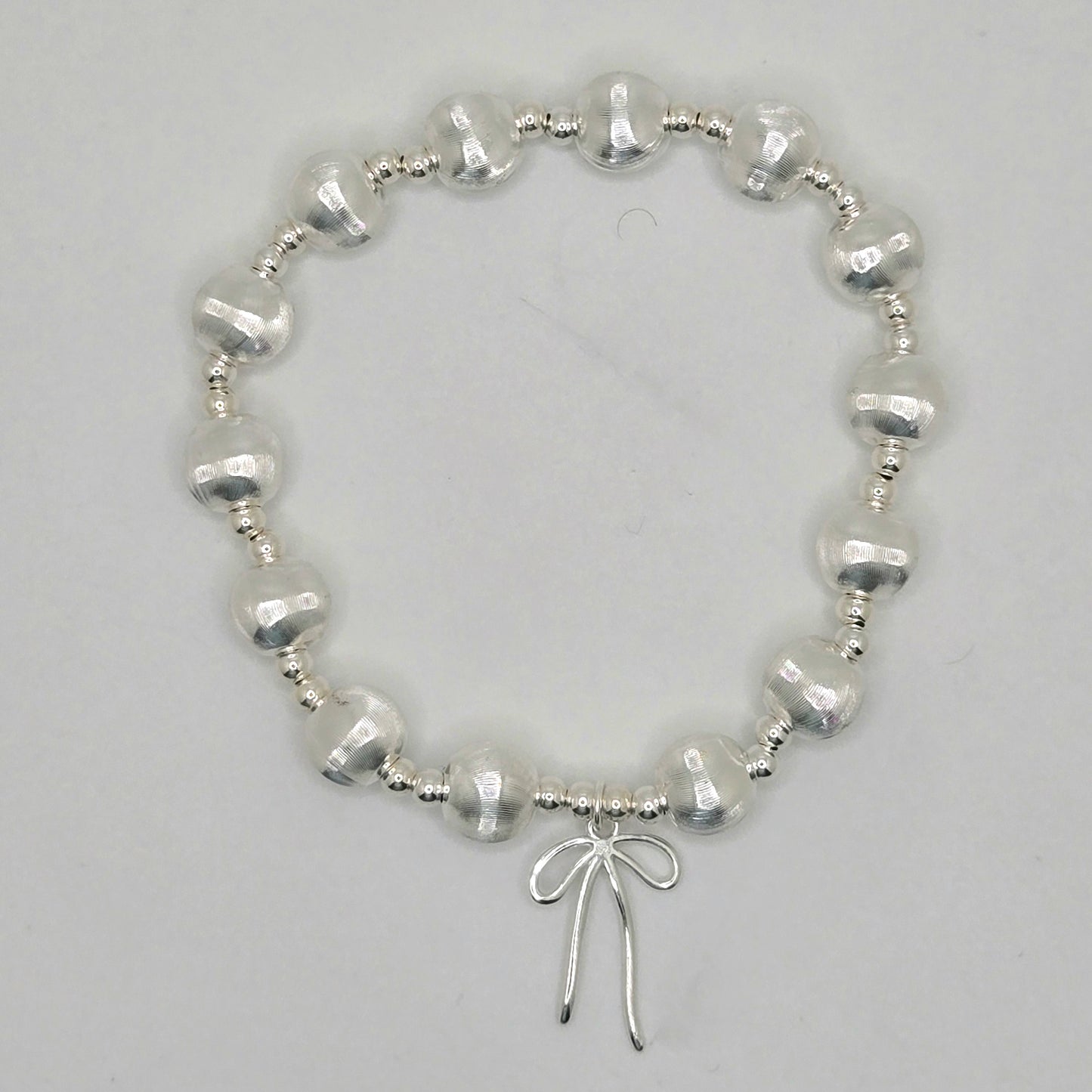 Cat's Eye Bead and Bow Bracelet