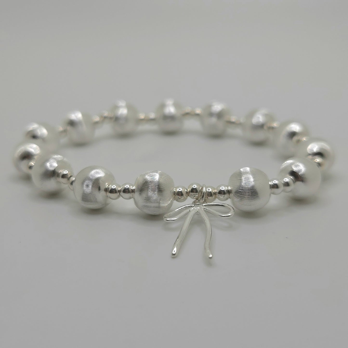 Cat's Eye Bead and Bow Bracelet