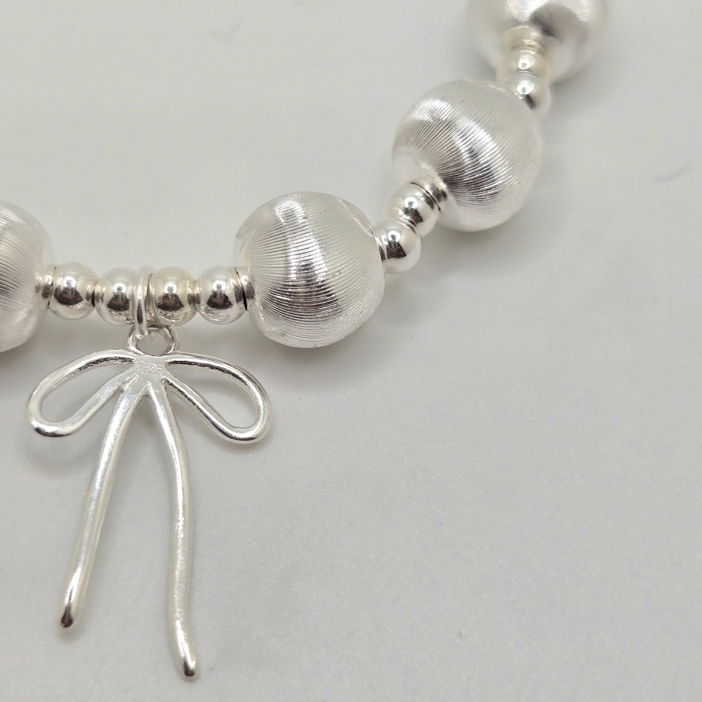 Cat's Eye Bead and Bow Bracelet